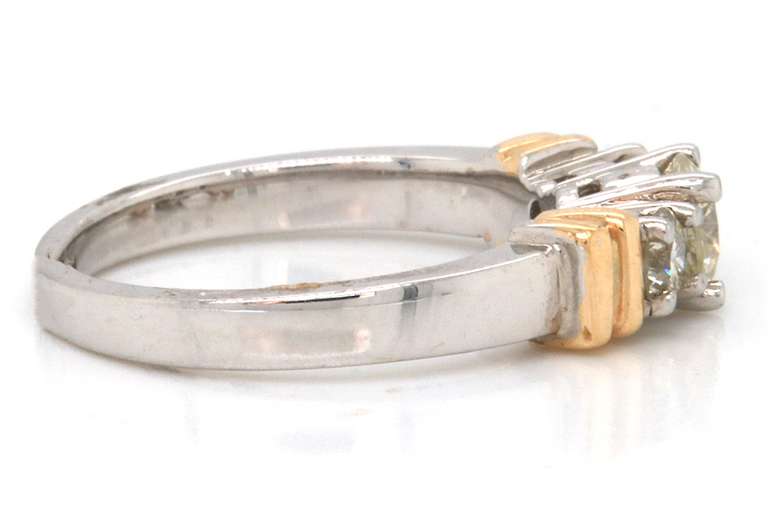 14KT SOLID GOLD AND 1.0 CARAT DIAMOND RING
