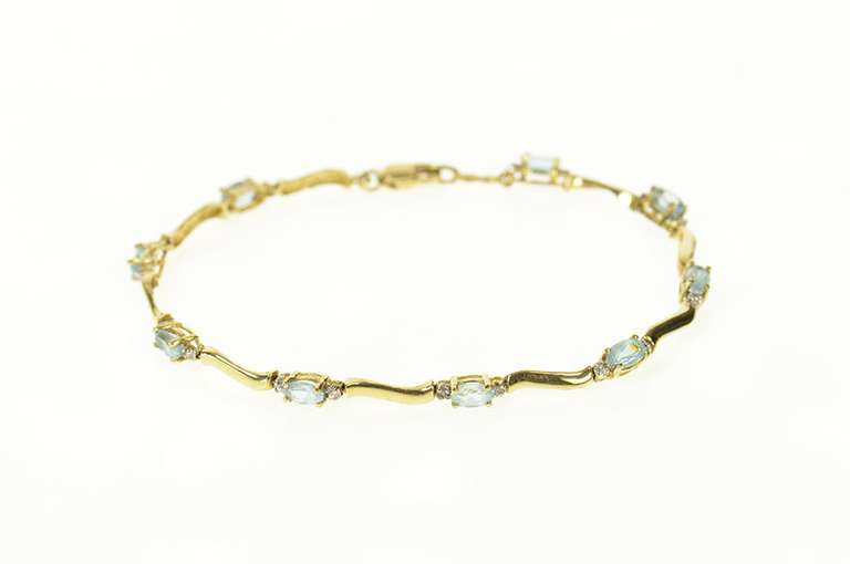 14K Yellow Gold Blue Topaz Diamond Accent Wavy Tennis Bracelet