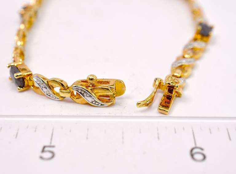 Gold Plated Sterling Silver Black Gemstone Infinity Bracelet.