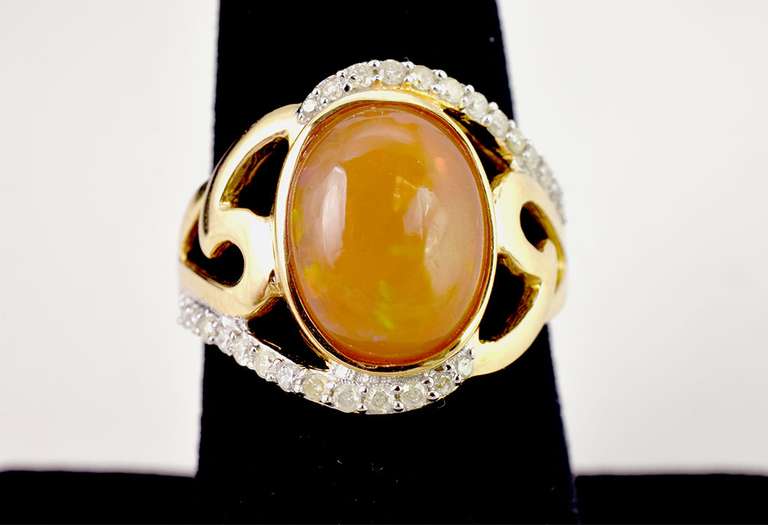 Fabulous 2.57CTS Ethiopian Opal Set in Gold Plated Sterling Silver Ring With .26CTW of Accenting Diamonds