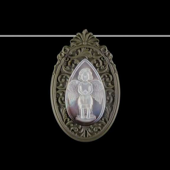 Simply beautiful 117.4ct Mother of Pearl angel carving