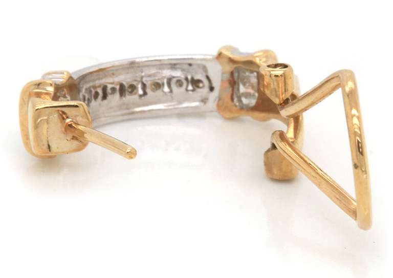 14k two tone ladies diamond earrings.