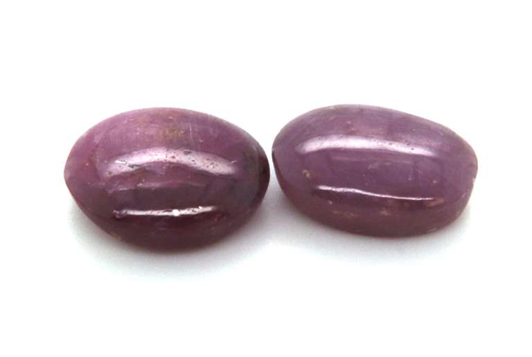 Pair of Oval Shaped Star Ruby cabochon Gemstones, 16.78ct
