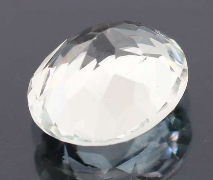 Glittering 5.85ct 10x12mm unheated green Amethyst