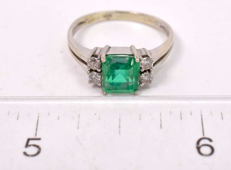 Classy Ladies Emerald Ring with Diamonds in 14KT White Gold