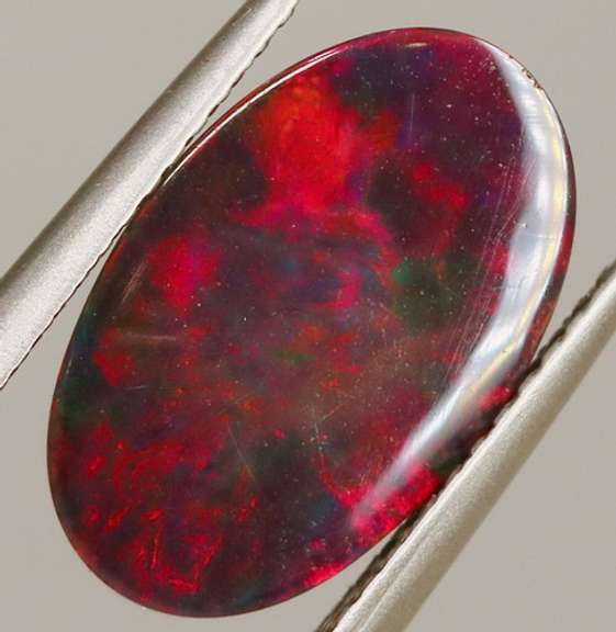 Glistening 3.11ct fiery flashing Welo Black Opal