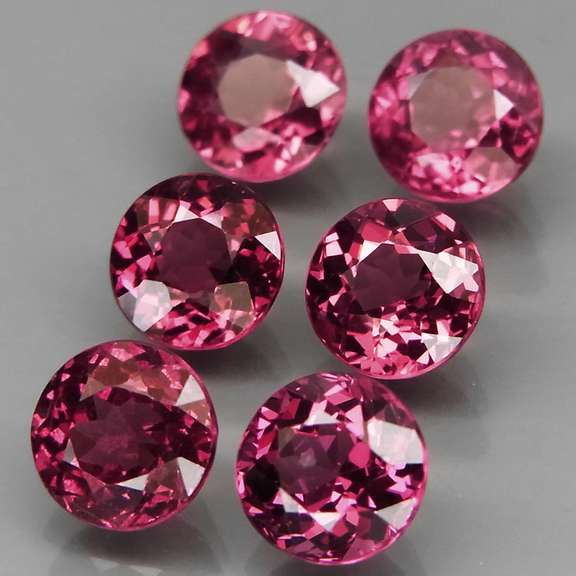 Ravishing 6.51ct rich pinkish violet Rhodolite Garnet set