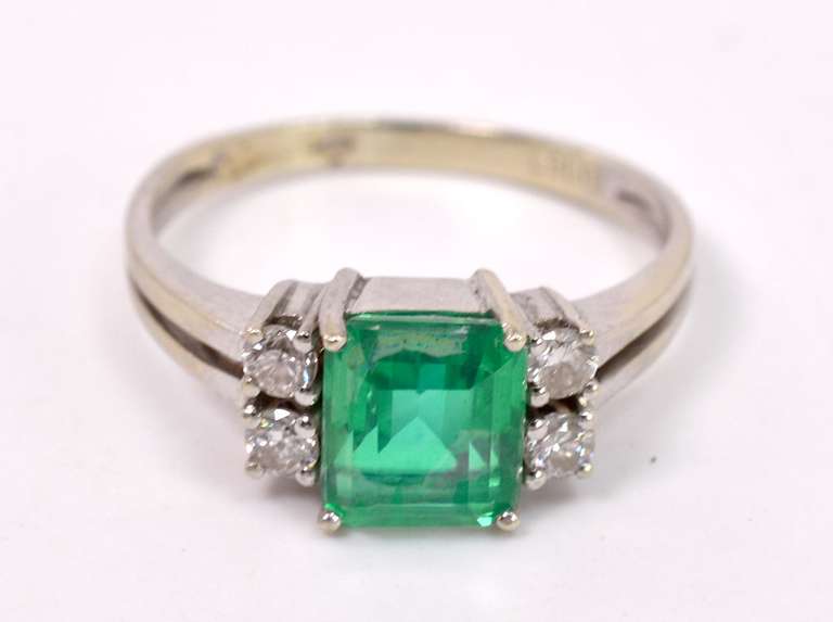 Classy Ladies Emerald Ring with Diamonds in 14KT White Gold