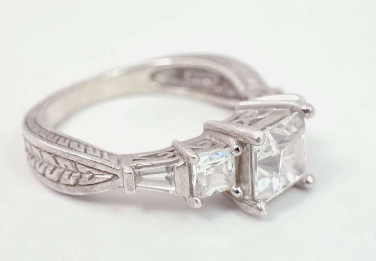 Carved Sterling Silver Ring with CZ Crystals.