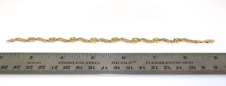 Fashionable Peridot Gold Link Bracelet