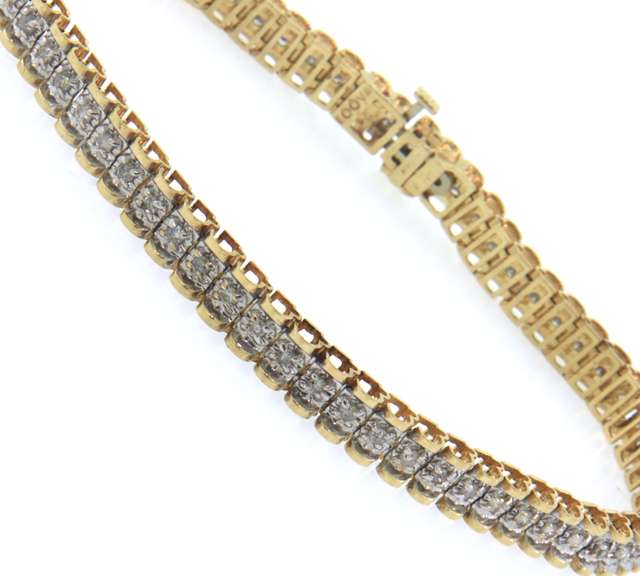Eye- Catching 14k yellow & white gold diamond tennis bracelet