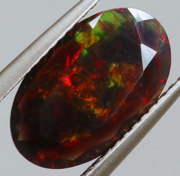 Glistening 2.01ct fiery flashing Welo Black Opal
