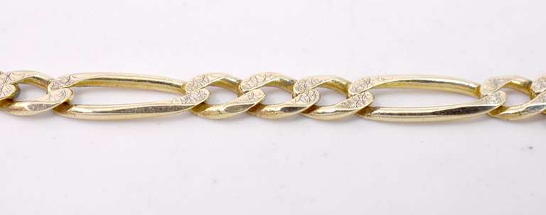 Subtle Textured Figaro Style Bracelet in 14K Yellow Gold