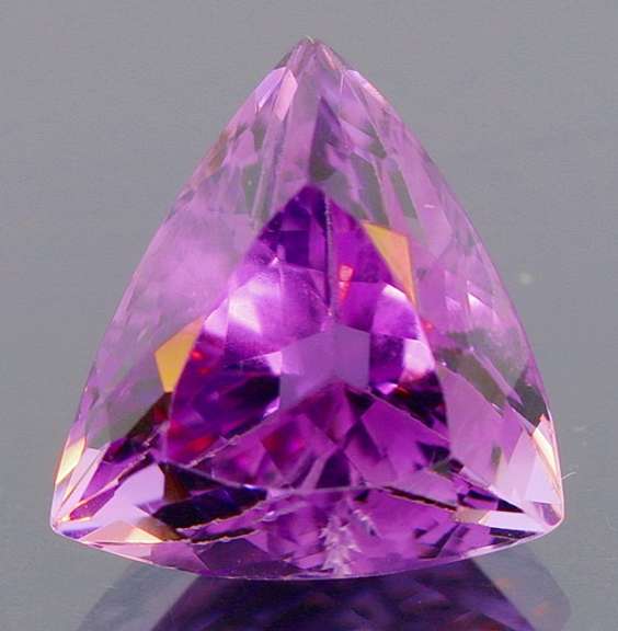 Glittering 7.82ct trillion cut Brazilian Amethyst