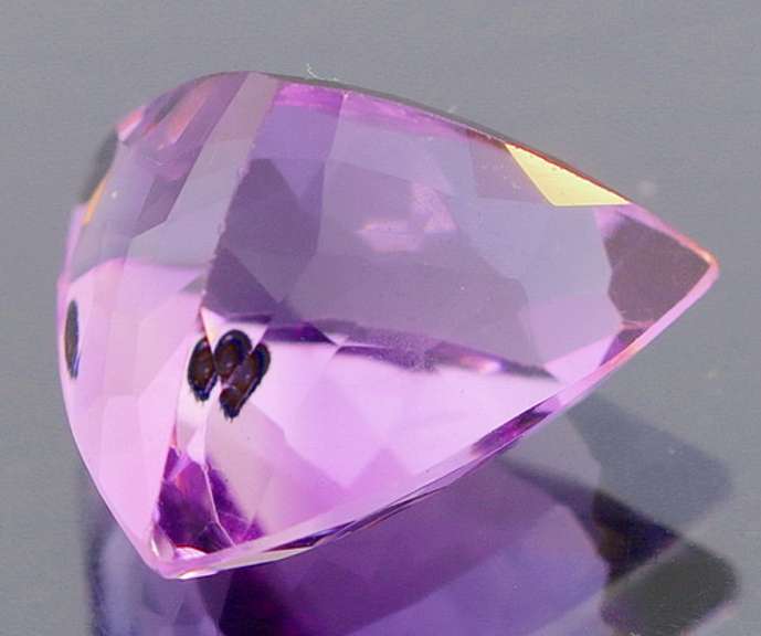 Glittering 7.82ct trillion cut Brazilian Amethyst