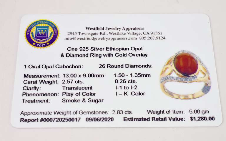 Fabulous 2.57CTS Ethiopian Opal Set in Gold Plated Sterling Silver Ring With .26CTW of Accenting Diamonds