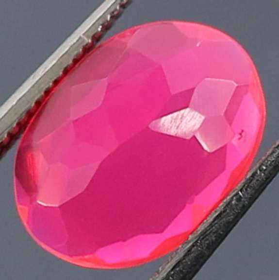 Killer 1.19ct play of color faceted pink Opal