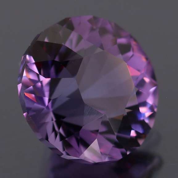Exceptional 7.66ct color shifting Amethyst solitaire