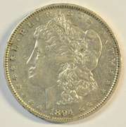 Flashy key date 1894-O Morgan Silver Dollar. AU/Slider