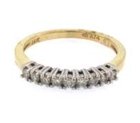 Pretty 14k yellow gold round diamond band ring