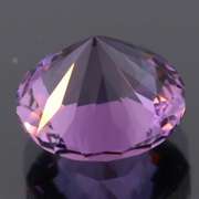 Exceptional 7.66ct color shifting Amethyst solitaire