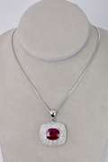 Ravishing 8.22CTS Ruby Set within A Sterling Silver Pendant with a 3.23CTW White Sapphire Gallery
