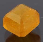 Vibrant 5.26ct emerald cut orange Sapphire