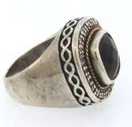 Sterling silver antique ring with brown precious stone