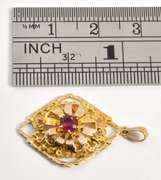 Garnet Pendant with Ornate Gold Work