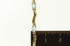 14K Yellow Gold Blue Topaz Diamond Accent Wavy Tennis Bracelet