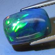 Magnificent 2.25ct floral flashing Black Opal