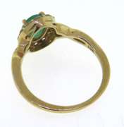 Oval Cut Emerald and CZ Ring in Yellow Gold