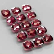 Double checker cut! 6.97ct violet red Rhodolite Garnet set