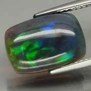 Magnificent 2.25ct floral flashing Black Opal