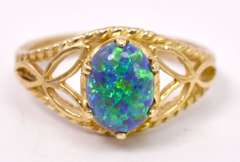Ravishing Cabochon Opal Set in Intricate Yellow Gold Ladies Ring