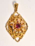 Garnet Pendant with Ornate Gold Work