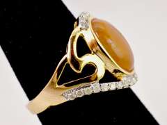Fabulous 2.57CTS Ethiopian Opal Set in Gold Plated Sterling Silver Ring With .26CTW of Accenting Diamonds