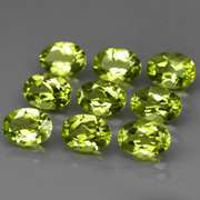 Dazzling 7.26ct untreated apple green Peridot set