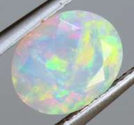 Highly expressive full floral 1.48ct faceted Jelly Opal