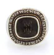 Sterling silver antique ring with brown precious stone