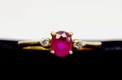 Lovely Oval Cut Ruby Set in 18K Yellow Gold Diamond Ring