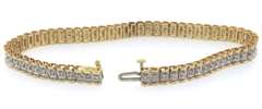 Eye- Catching 14k yellow & white gold diamond tennis bracelet