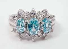 Bright Blue Crystals Set in Sterling Silver Ring With White Crystal Accents