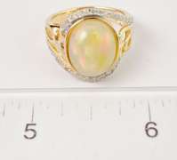 Opulent 3.72CTS Cabochon Opal Set in Open Shoulder Sterling Silver Ring with 0.34CTW Accenting Diamonds