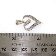 Contemporary 14kt White Gold Heart-Shaped Pendant with Baguette Diamonds