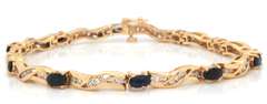 LADIES 14 KT YELLOW GOLD DIAMOND AND SAPPHIRE BRACELET.