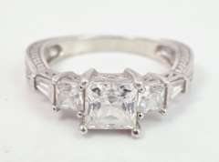 Carved Sterling Silver Ring with CZ Crystals.