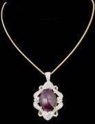 Inspiring Huge 38.00CTS Cabochon-Cut Star Ruby and 4.50ctw White Sapphires on Gold Plated Sterling Silver