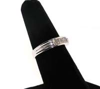 Contemporary 14kt White Gold Ring with Channel set Diamonds
