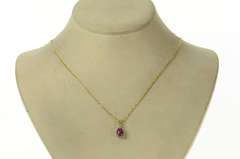 14K Yellow Gold 1.80 Ctw Oval Star Ruby Diamond Accent Pendant